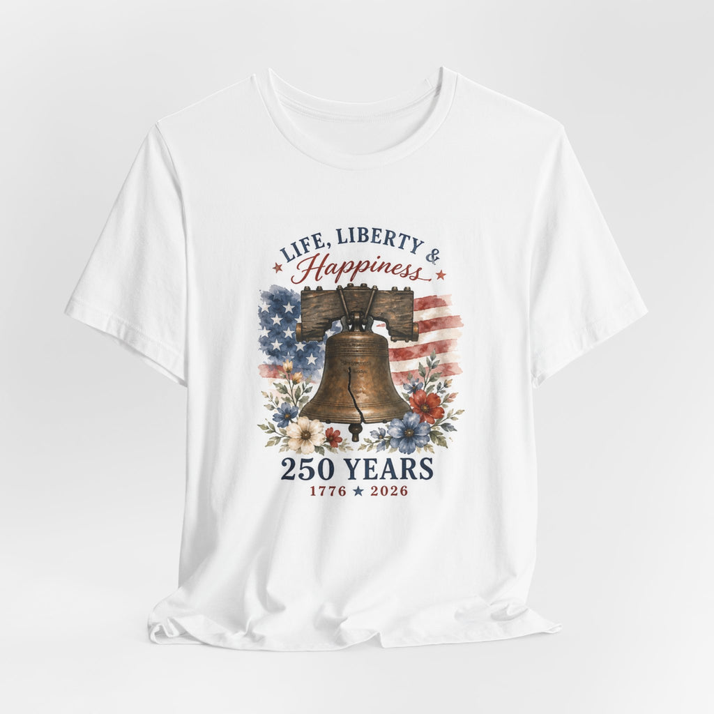 White t-shirt with Liberty Bell, American flag, flowers, and "Life, Liberty & Happiness 250 Years 1776-2026".