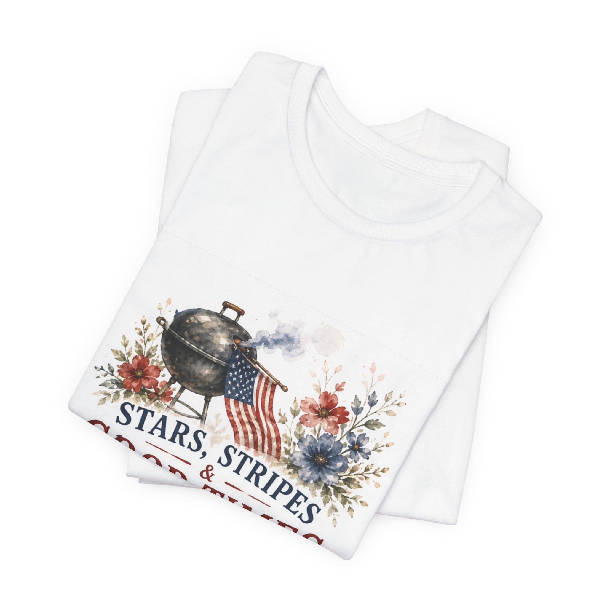 White t-shirt with American flag, grill, and floral design, "Stars, Stripes & God Bless America".