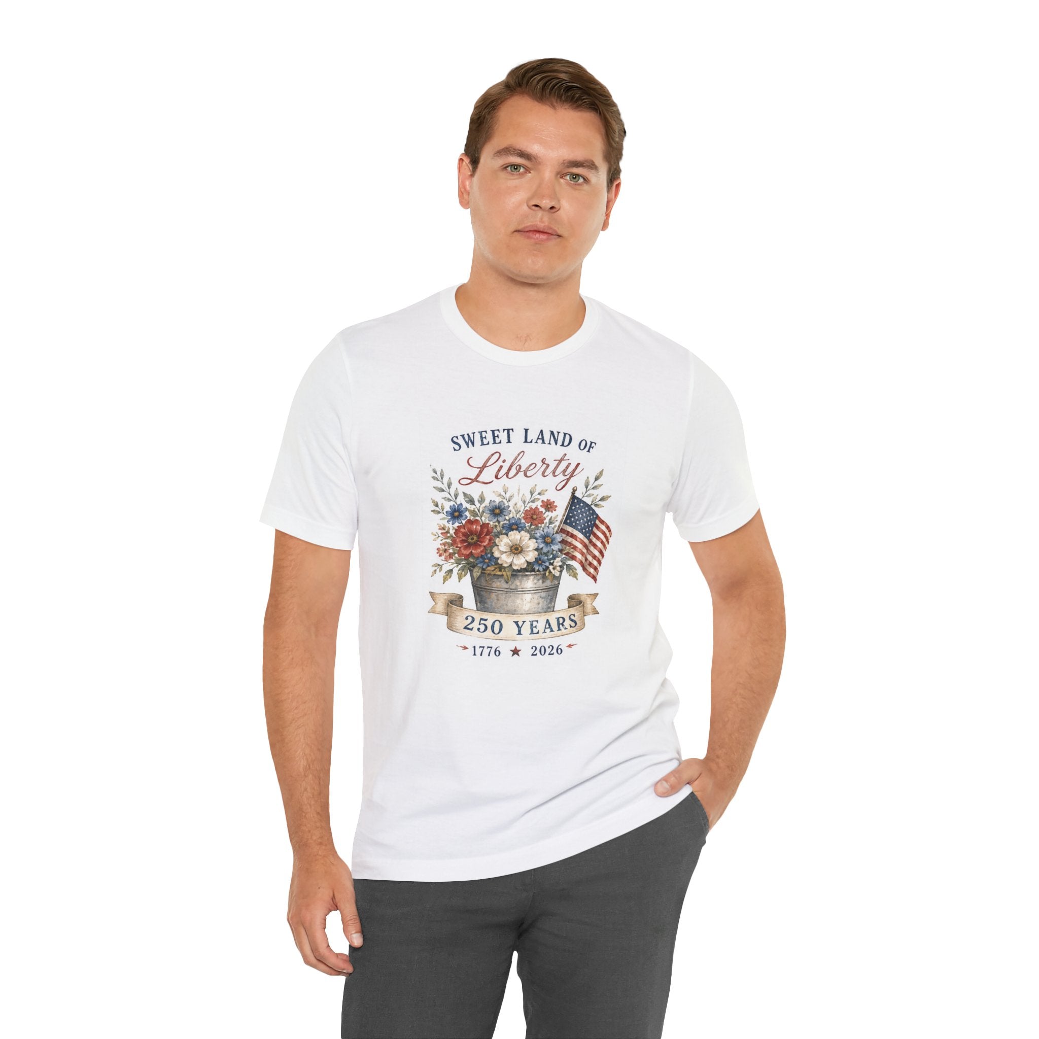 White t-shirt with "Sweet Land of Liberty 250 Years" and patriotic flowers.